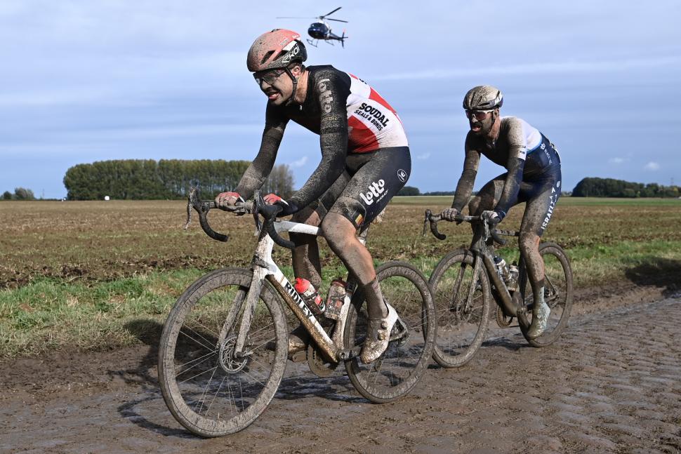 Florian Vermeersch of Lotto Soudal attempts to escape from a small helicopter during Paris-Roubaix Credit SWpix.com