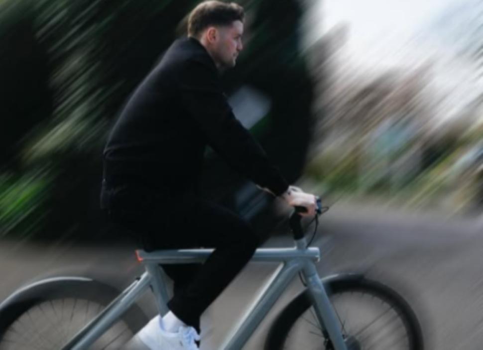 Premier League manager Fabian H&uuml;rzeler riding Van Moof bike for advert