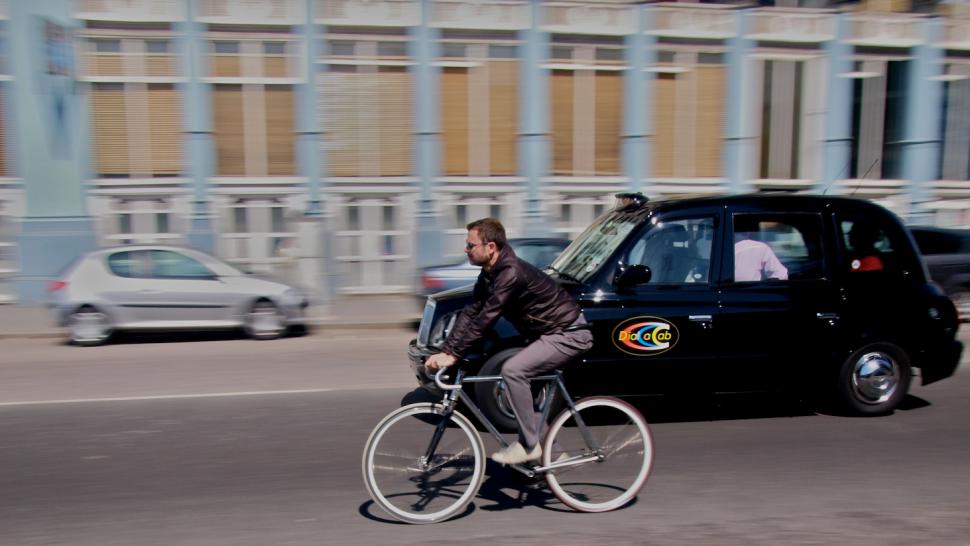 Taxi and Cyclist copyright Simon MacMichael.jpg