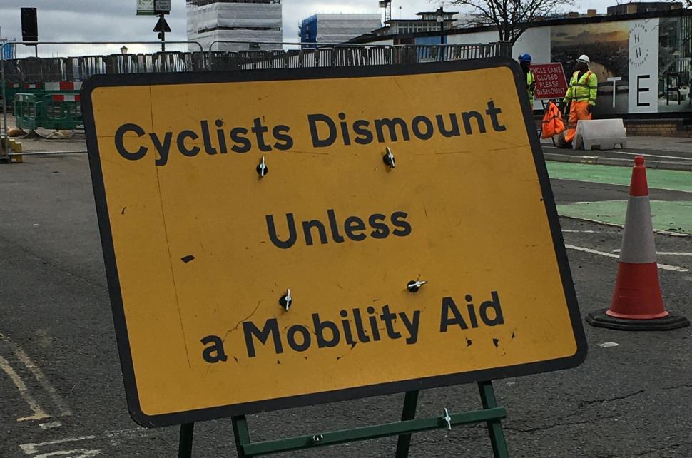 Cyclists dismount unless mobility aid (Wheels for Wellbeing)