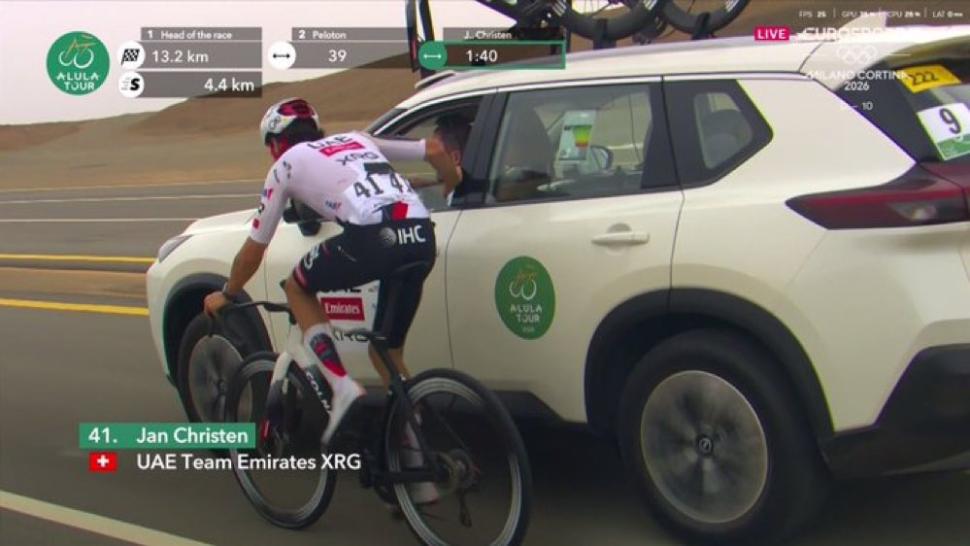 Jan Christen with UAE team car at 2026 AlUla Tour