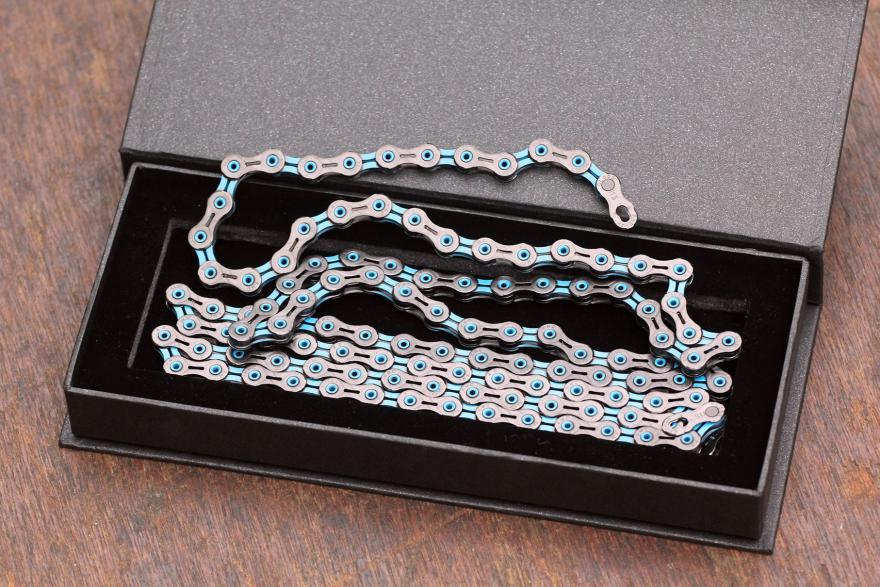 KMC X11SL DLC Black-Blue Chain.jpg