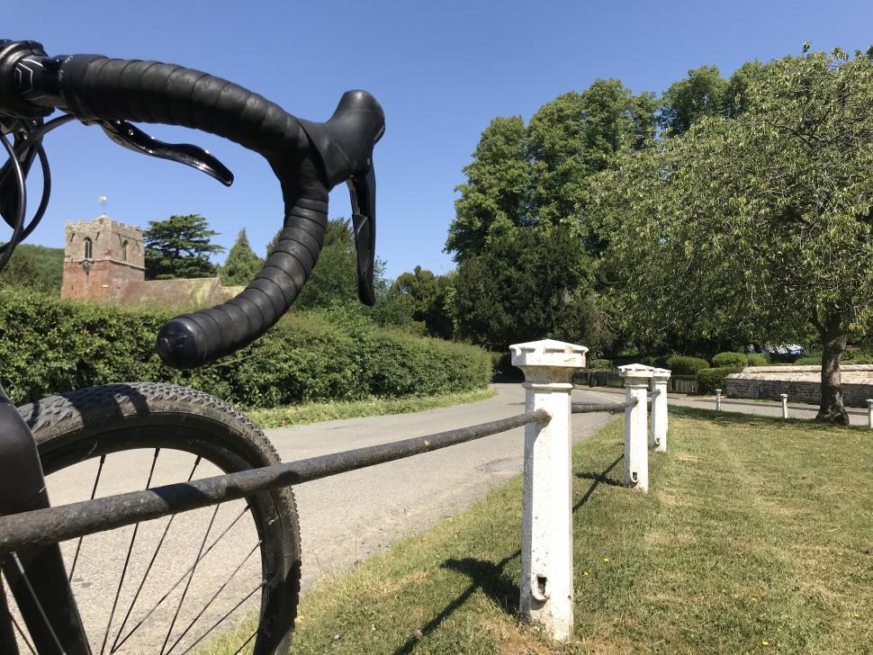 komoot coffee ride Lara Dunn -the pretty village green at Eastnor
