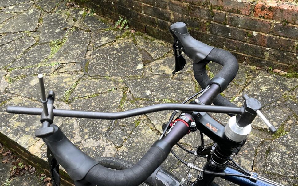 Lever height tool on bike left