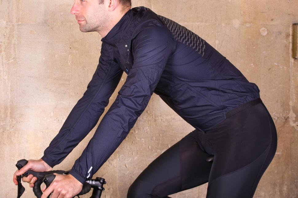 Metier Beacon Rain Jacket - riding.jpg