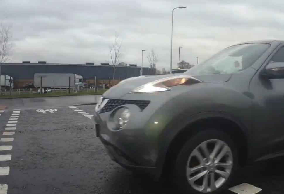 Motorist drives through cyclists parallel crossing