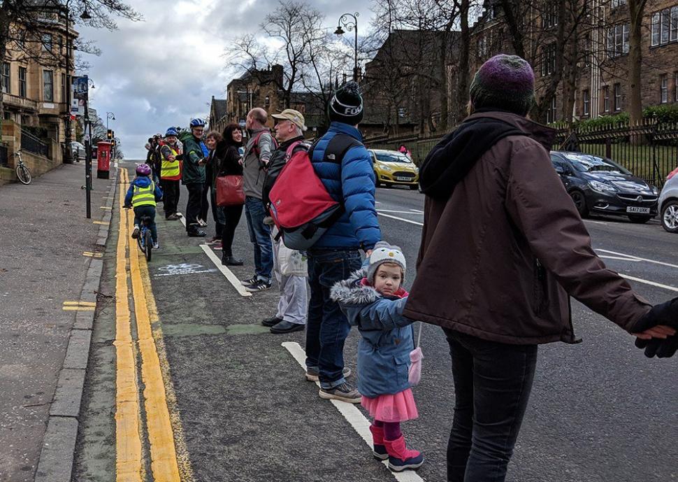 People protected bike lane in Glasgow (via GoBike on Twitter)