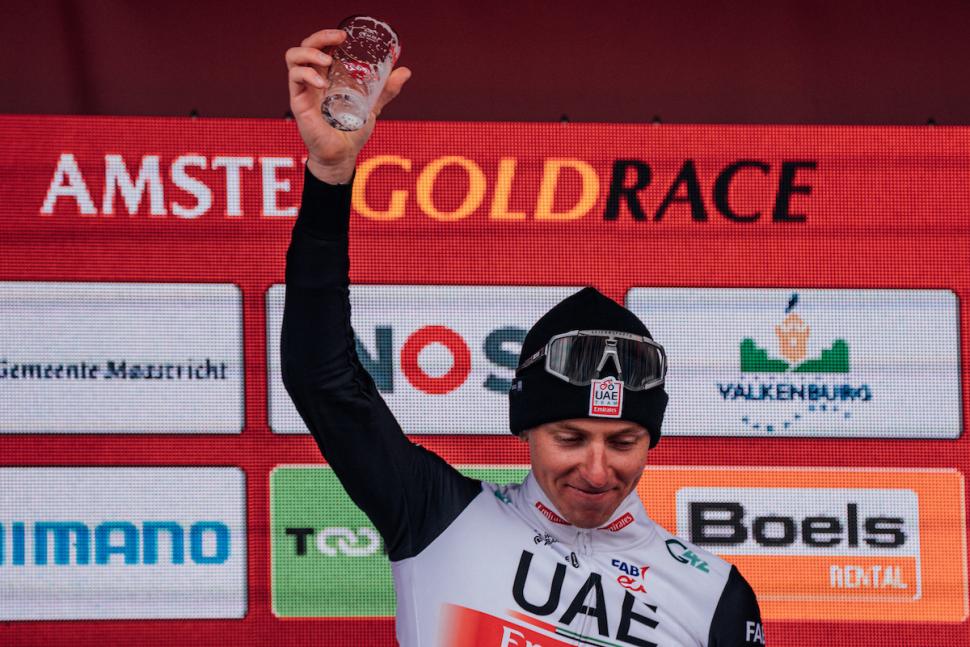 Pogacar drains beer after winning 2023 Amstel Gold (Zac Williams/SWpix.com)