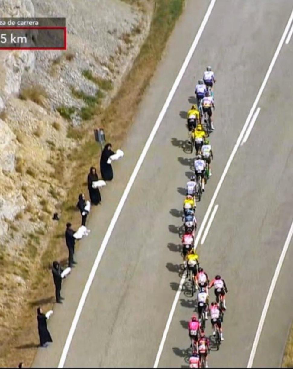 Pro-Palestine demonstrators at the roadside, 2025 Vuelta stage 11