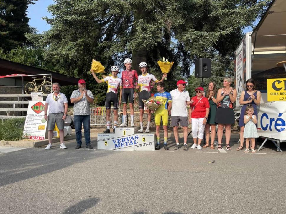 R&eacute;mi Arsac and Charly Merle on the podium with winner Simon Ruet after celebrating too early at the Crit&eacute;rium de Saint-Symphorien-sur-Coise in eastern France (credit &ndash; Mont Actus)