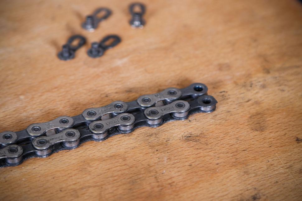 Replacing a bike chain - 14 - sizing new chain in comparison to old.jpg