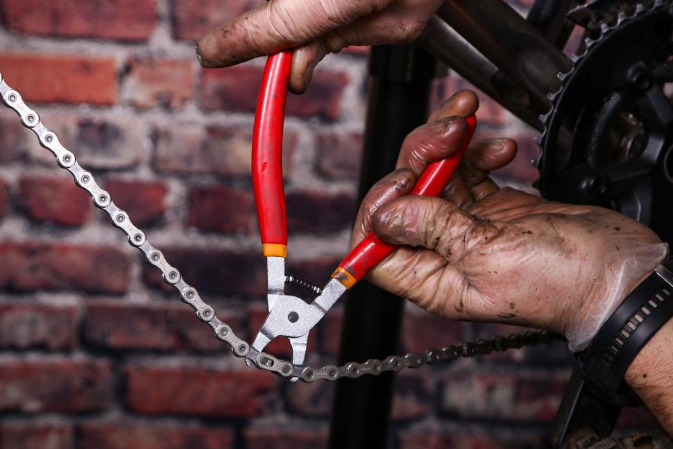 Replacing a bike chain - 25 - seating the magic link with pliers.jpg