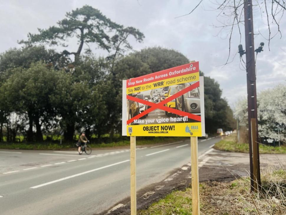 Signs campaigning against plans for new relief road in Watlington (Oxfordshire Roads Action Alliance)
