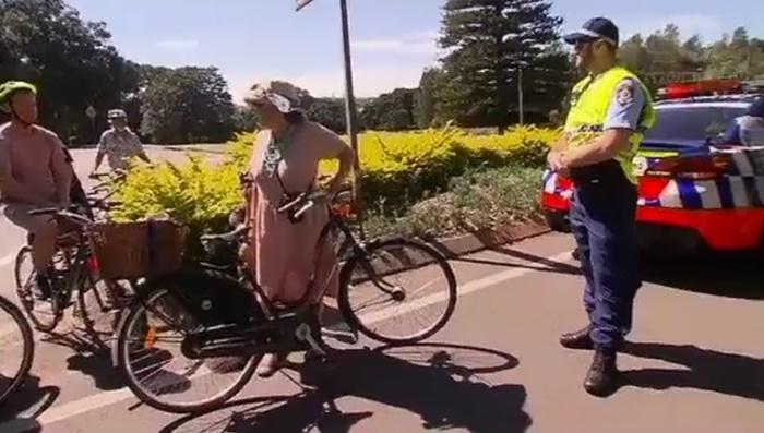 Sydney helmet protest ride (via Facebook video).jpg