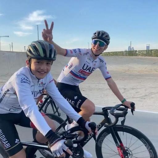 Tadej Pogacar and fan - credit UAE Team Emirates