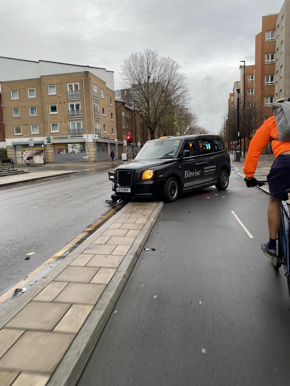Taxi driver crashes into cycle lane, Greenwich