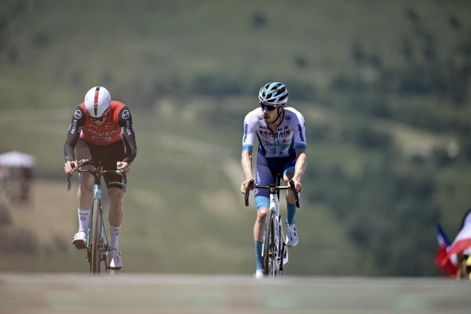 Arnaud Démare being overtaken by Phil Bauhaus, stage 13 of 2025 Tour de France