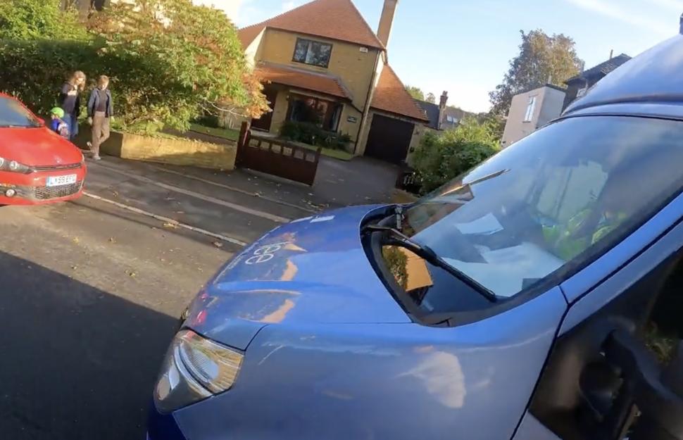 Van trying to close pass cyclist (Twitter)
