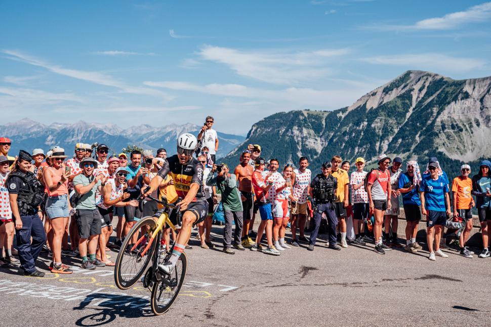 Arnaud De Lie pops a wheelie on Superdevoluy, 2024 Tour de France